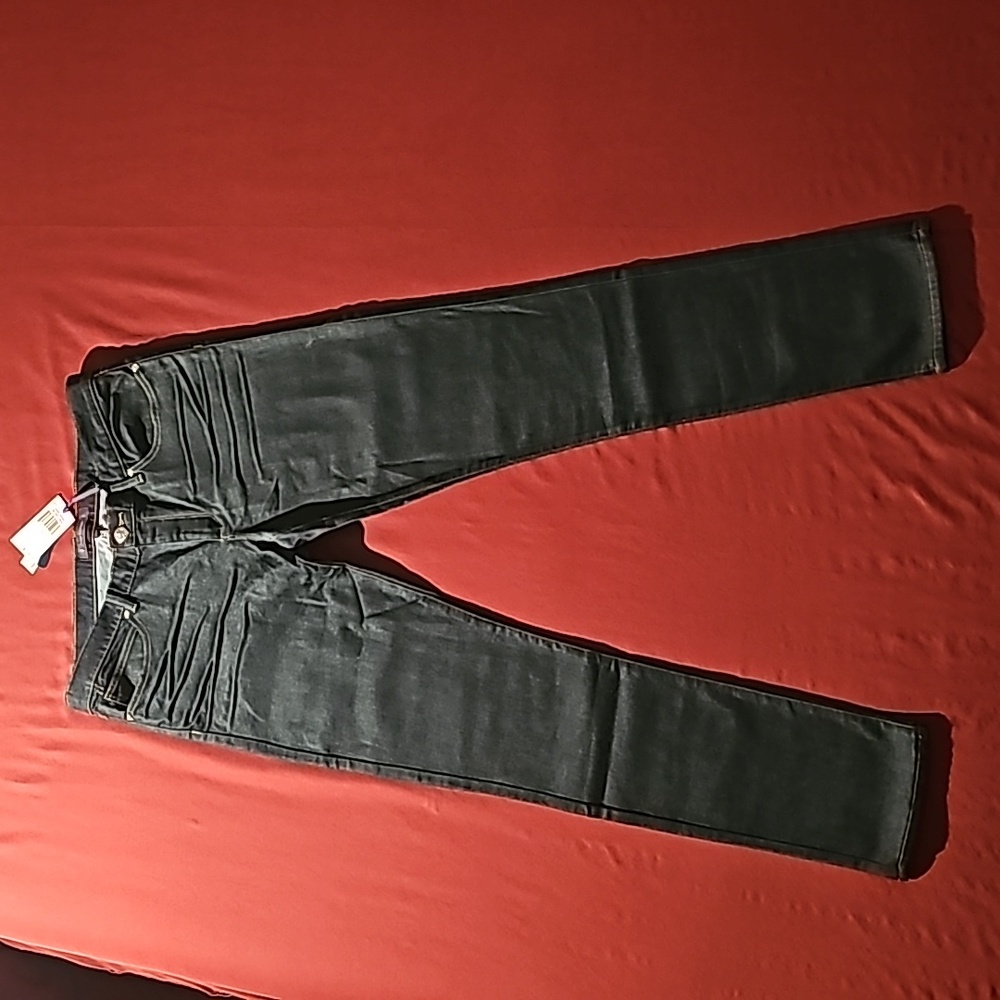 Woman's,  Juicy Couture,  size 32, dark blue skinny jeans